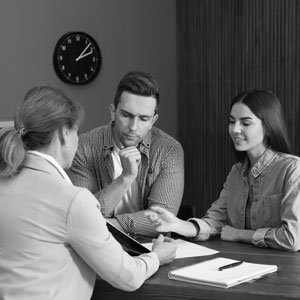 Law Consultation Meeting: Couple and lawyer. 