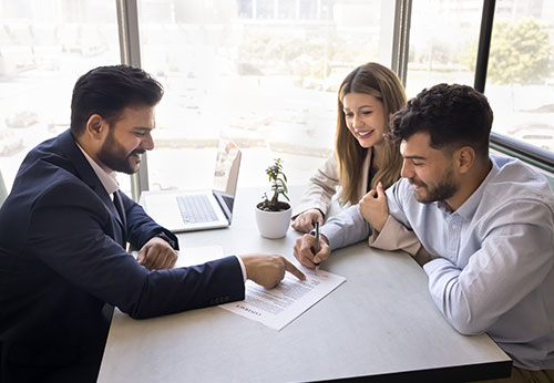 Professional reviewing legal prenuptial contract with family lawyer